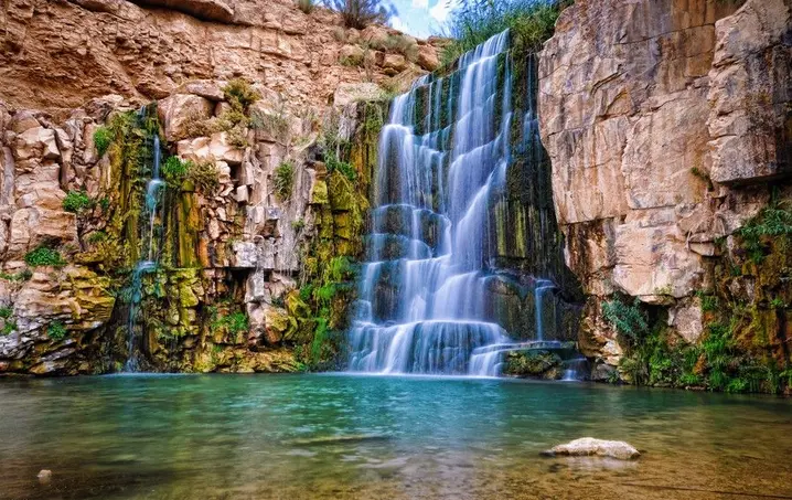 Natural rock pools and waterfalls in Wadi Hidan Jordan